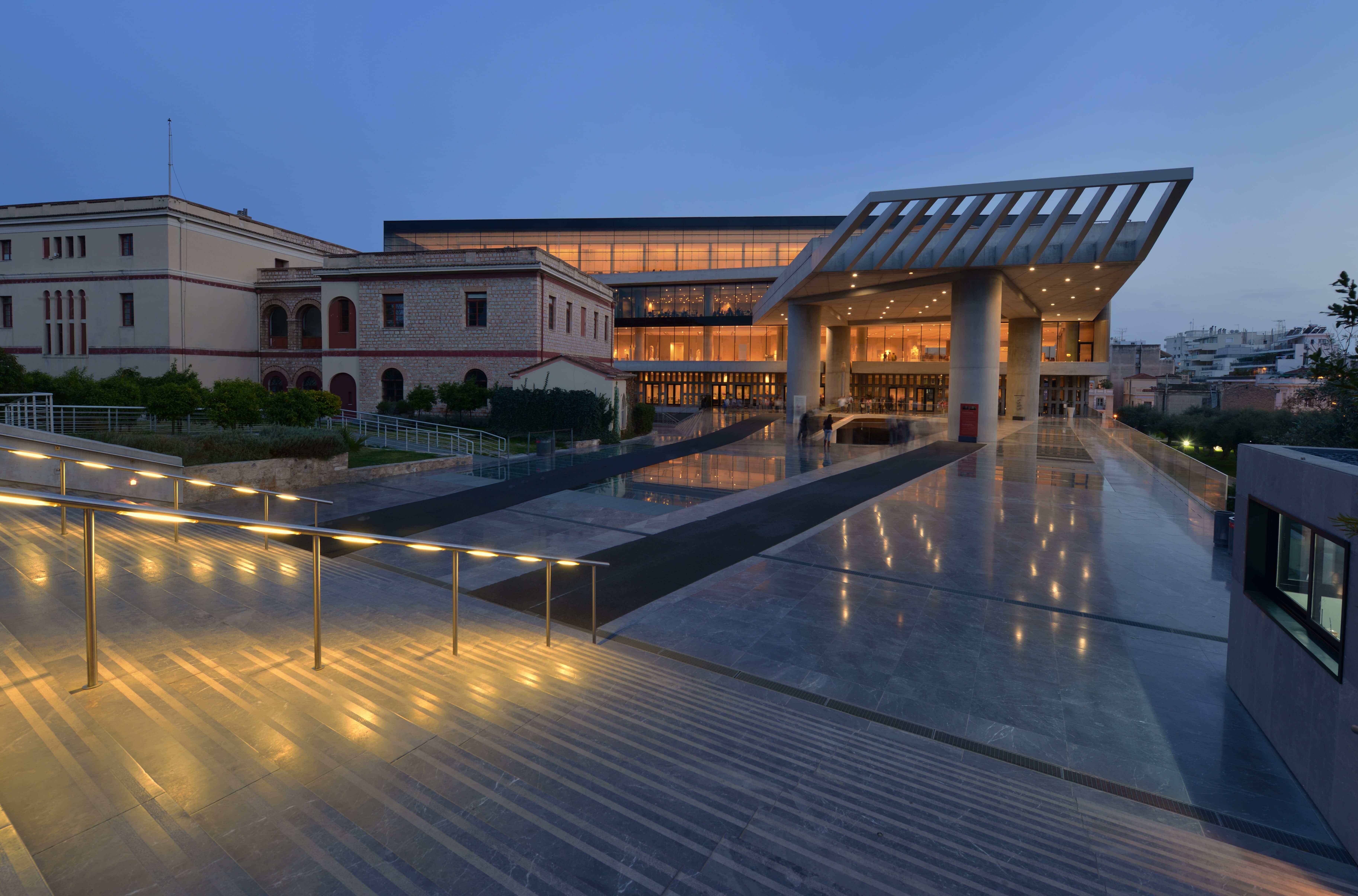 Exterior view at night of the Acropolis museum in Athens, Greece.